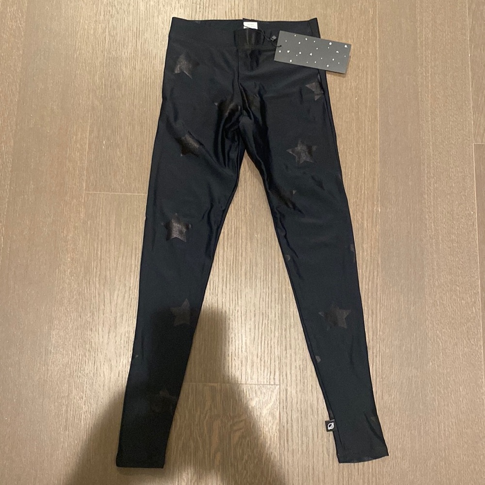 NWT Terri kids star shiny leggings size medium